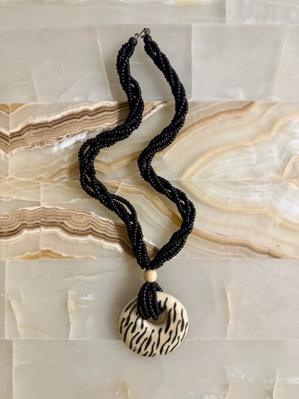 Black Beaded Necklace with Zebra Pendant